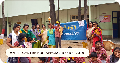 Session under a Rotary Uptown banner at Amrit Centre for Special Needs, 2019